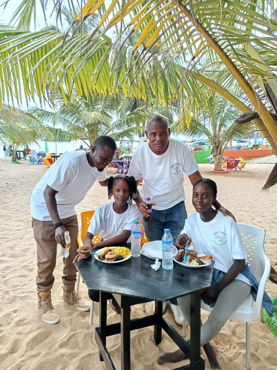 Mouabon family members sharing a meal together